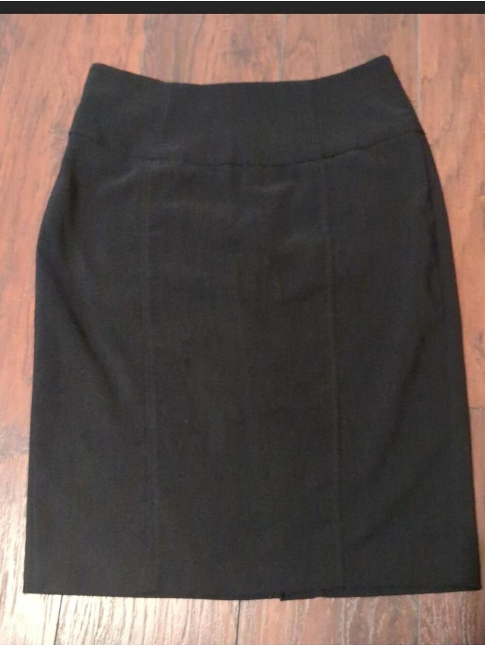 black midi skirt with zipper and slit. Size M